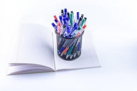 Pen box, organizer for school supplies on a white background on the desk