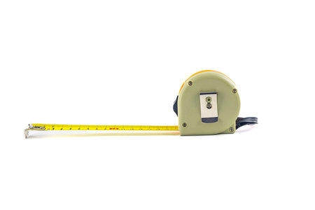 Metal construction tape measure, rolled measuring tape, tape measure on white background