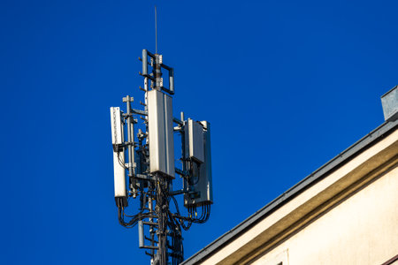 Antenna on the roof of a building, receiving terrestrial televisionの写真素材