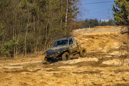Off-road vehicles built for driving in difficult terrain in mud, sand, off-road vehicle racing, off-road track competitionの写真素材