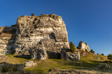 Towarne Mountains, the area around the castle in Olsztyn, a panorama of the mountains against the blue spring skyの写真素材