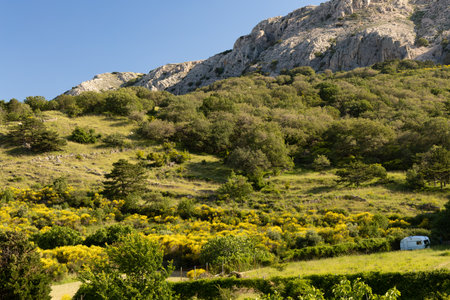 Tourist trail leading from Baska to the cemetery and to the Church of St. John, ruins of the Baska Church, view of the city from above, panorama with a beach on the island of KRKの写真素材