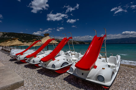 Water bike rental, water bikes with water slides, attractions for tourists, water sports equipment,の写真素材