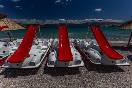 Water bike rental, water bikes with water slides, attractions for tourists, water sports equipment,の写真素材