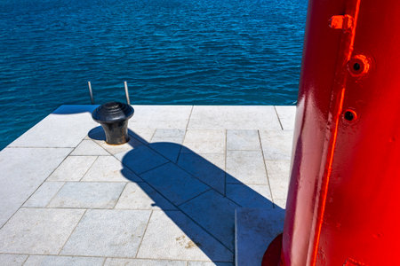 Red warning light for ships entering the port of Baska KRK in Croatia