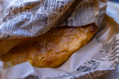 Bread in a paper bag, close-up, selective focus.の写真素材