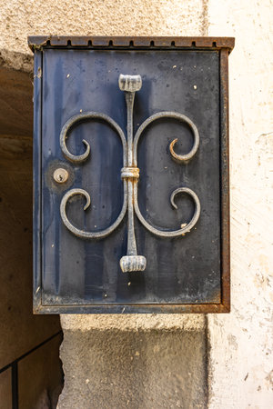 Vintage mail box on the wall of an old house in Italyの写真素材