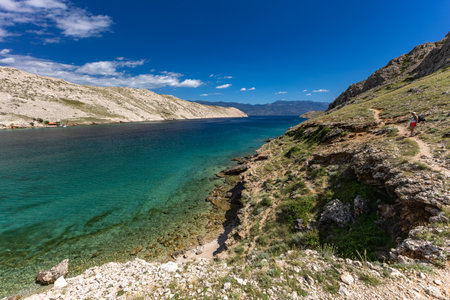 Panorama of the bay with the Vela Luka beach below, view of the beach from the top of the mountain,の写真素材
