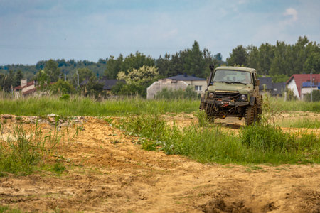 Off-road vehicle in difficult terrain, off-road car rally, off-road car racesの写真素材