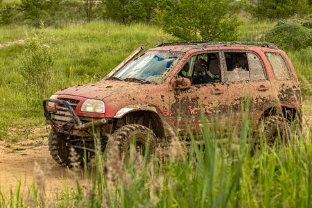 Off-road vehicle in difficult terrain, off-road car rally, off-road car racesの写真素材
