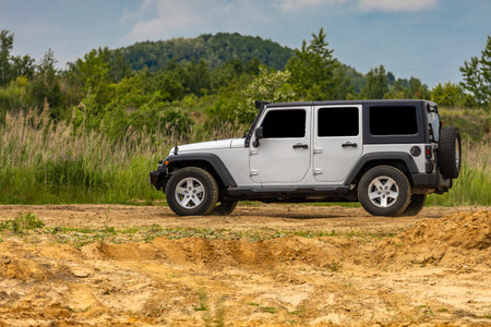 Off-road vehicle in difficult terrain, off-road car rally, off-road car races