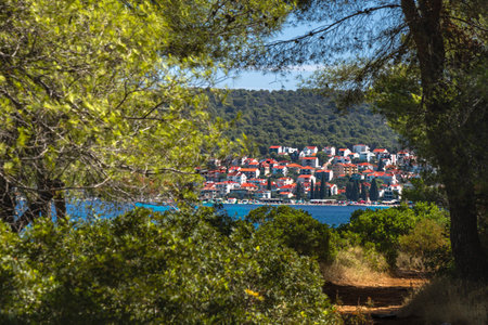 Empty pebble beaches, walking path along the island of Ciovo to Pendi Lagoon, panorama overlooking...