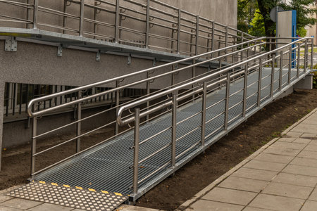 Accessible ramp for disabled people, metal ramp with handrails for strollers and disabled people,...