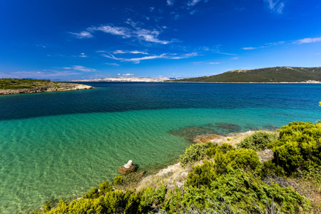 Sandy Sahara Beach on the island of Rab, the most beautiful FKK beach, naturist beach, blue water and cloudless sky,の写真素材