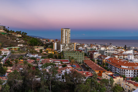 Panorama of the city of Puerto de la Cruz, early morning hours, sunrise, homes on the shores of the Atlantic Oceanの写真素材
