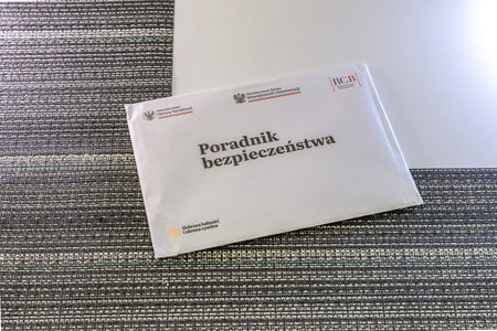 Czestochowa, Poland, February 14, 2026 - A man opens a letter sent by the Polish Ministry of...