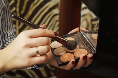 Brush for make-up artist, in the hand