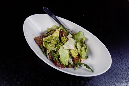 Chicken Salad. Salad with grilled chicken on plate. Grilled chicken breasts and fresh salad in plateの写真素材