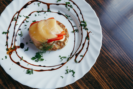 Top view of fish cutlet with mashed potato on wooden tableの写真素材