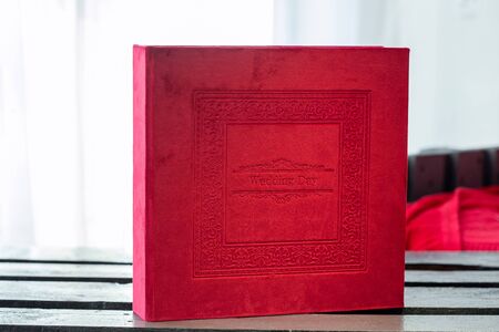 Photo album with a box on a woodenの写真素材