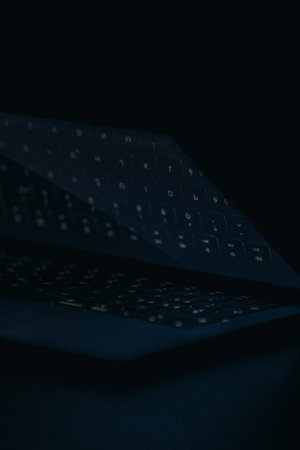 Close up shot of a black paper sheet with text on it