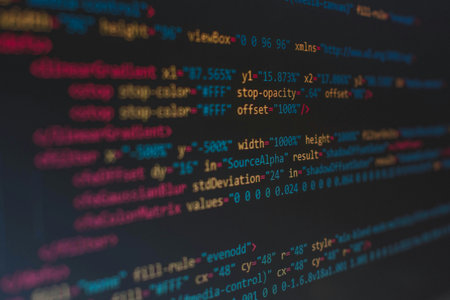 Programming code on computer monitor. Software development. Close up.