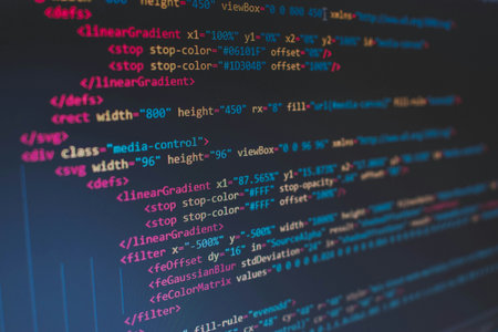 Programming code on computer monitor. Software development and programming concept.