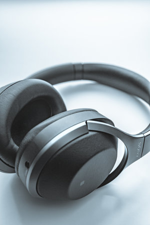 Headphones on a white background. Shallow depth of field. Toned.の写真素材