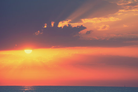 Beautiful sunset over the sea. Nature background. Toned.