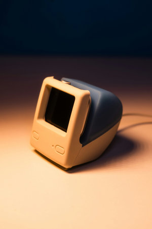 Computer monitor on a blue background. Shallow depth of field.