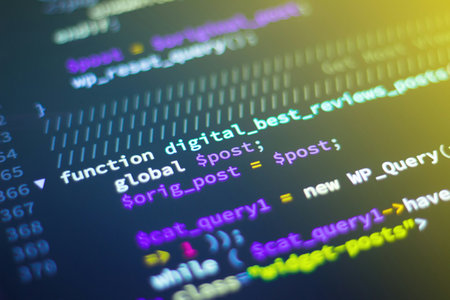Programming code on the screen of a computer monitor, close-up