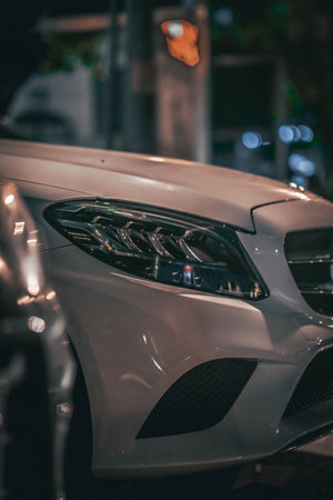 Selective focus point on Headlight lamp car - vintage filter effectの写真素材