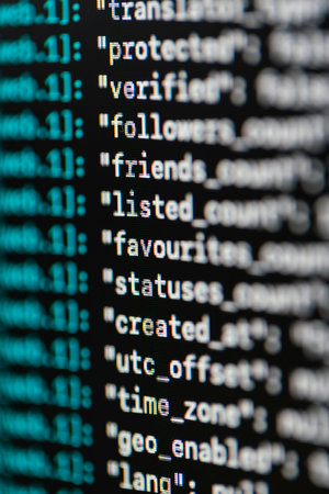 Computer screen close-up with text and numbers. Abstract computer background.