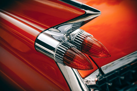 Close-up of the headlight of an old classic car.