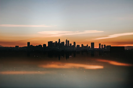 Sunset over the city with reflection in the lake, Chicago, Illinois, USA