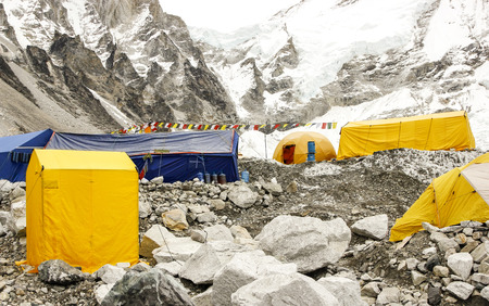Tents in Everest Base Camp in cloudy day  Here starts the climb to reach the top of the highest mountain in the world, Everest Region, Sagarmatha National Park, Himalayas, Nepal  の写真素材