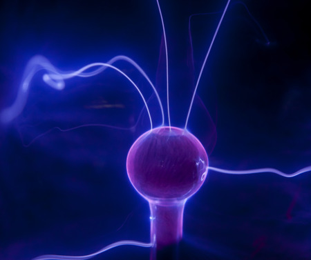 Pink plasma ball with blue blots, abstract background  