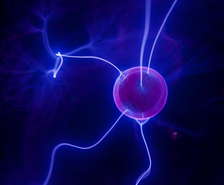 Pink plasma ball with blue blots, abstract background  の写真素材