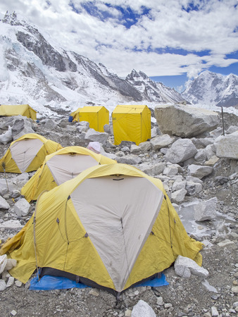 Tents in Everest Base Camp in cloudy day  Here starts the climb to reach the top of the highest mountain in the world, Everest Region, Sagarmatha National Park, Himalayas, Nepal  の写真素材