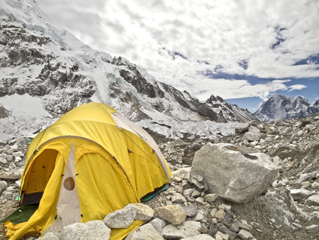 Tents in Everest Base Camp in cloudy day  Here starts the climb to reach the top of the highest mountain in the world, Everest Region, Sagarmatha National Park, Himalayas, Nepal  の写真素材