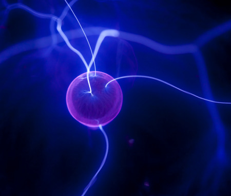 Pink plasma ball with blue blots, abstract background  の写真素材