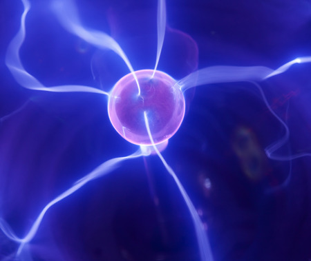 Pink plasma ball with blue blots, abstract background  の写真素材