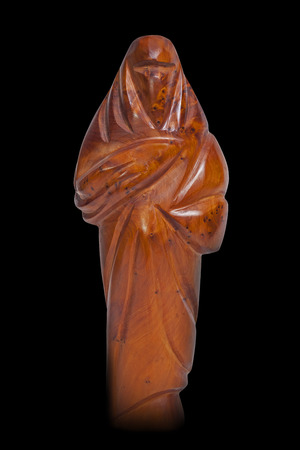 covered arabian woman, silhouette made of woodの写真素材