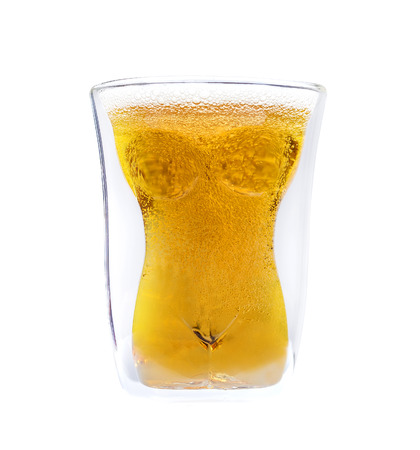 Concept of alcohol and pleasure, beer in woman shape glass の写真素材