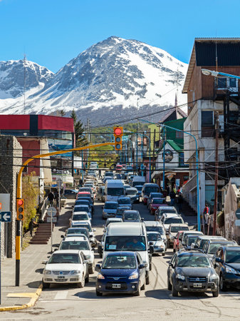 Ushuaia, ARGENTINA - October 28  Traffic jam on street with mountain over the city, October 28, 2013 in Ushuaia, Argentina のeditorial素材