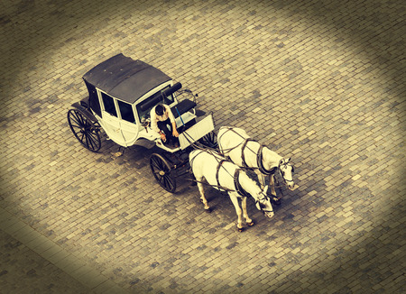 Horse carriage waiting for tourists in Prague, vintage style の写真素材