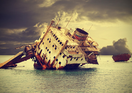 The sunken shipwreck on the reef, Egypt, vintage retro filtered  の写真素材