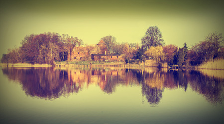 Vintage nature background of village lake view の写真素材
