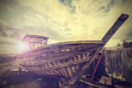 Vintage Old Boat on Junk Yard の写真素材