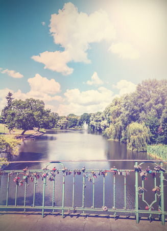 Vintage natue background with padlocks on bridge.の写真素材